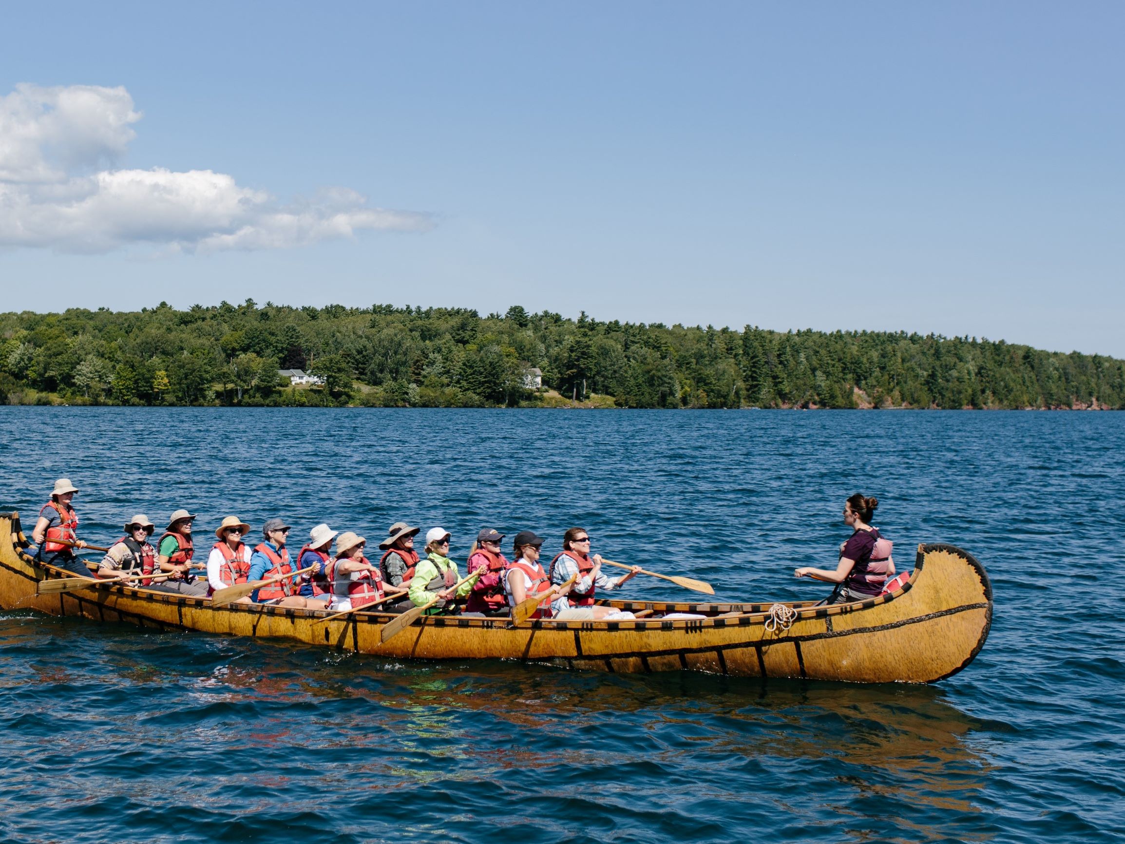 Wilderness Guide explains rapids to group of campers